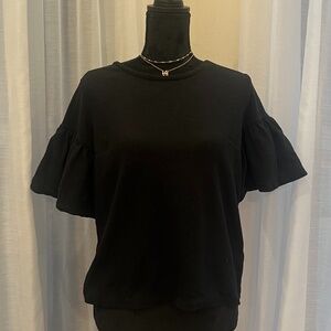 Black top with puff sleeves